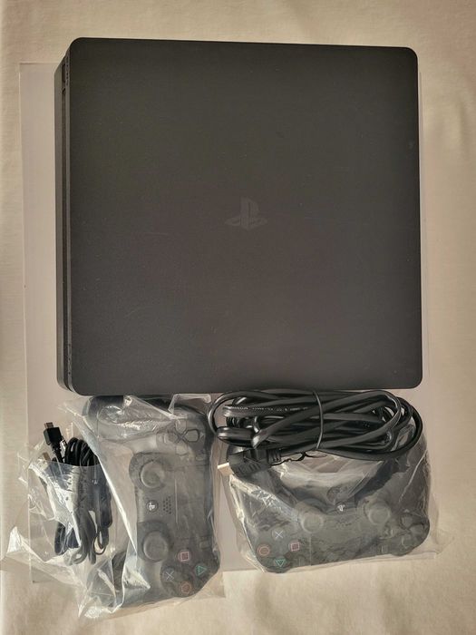 Playstation 4 Slim 1 TB + FIFA 25