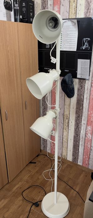 white IKEA Hektar floor lamp with 3-spotlights.