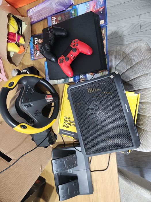 Vand ps4 playstation 4 + volan + 2 controllere + 6 jocuri + chiller