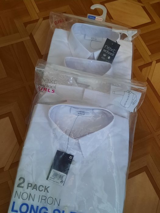 Продам новые рубашки Оверсайз фирмы Next для девочек рост 128