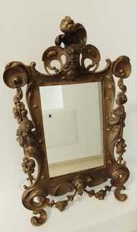 Oglinda veche in stilul Baroc din bronz masiv,piesa deosebita cu un fo