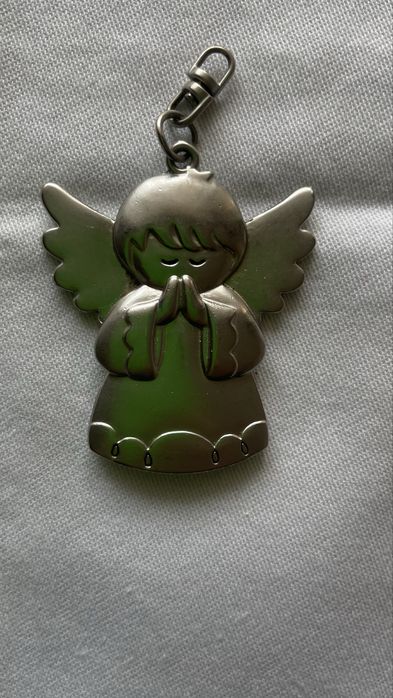 Продам металлическую фигурку- брелок  Ангел .