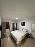 Garsonieră Modernă – Check-in Oricând, 24H/24