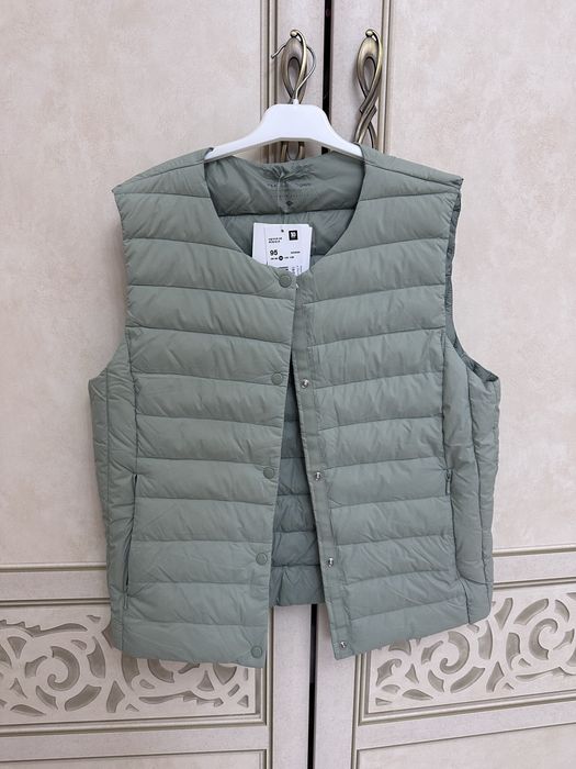 Жилет, безрукавка