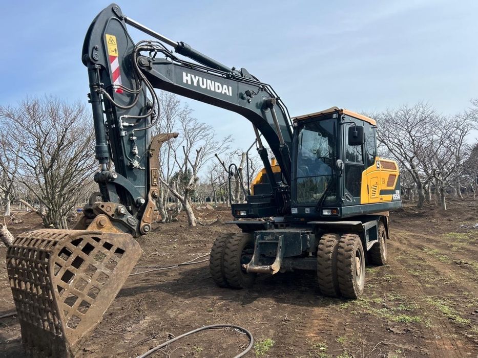 Экскаватор колесный 140,145 колесный экскаватор