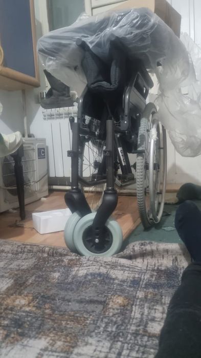 Инвалидную каляску