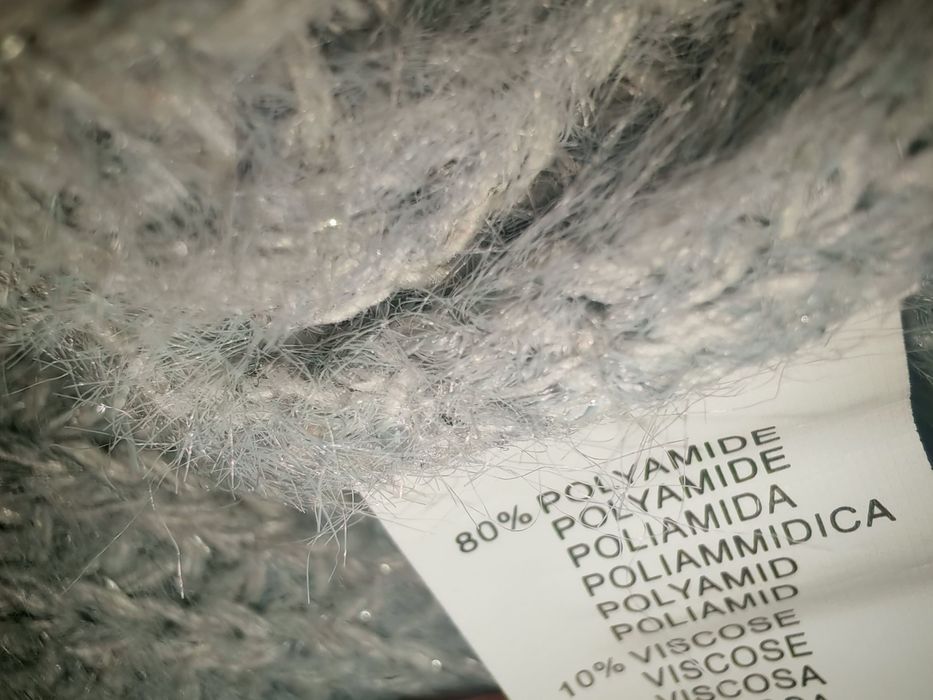 Pulover  varsta 10 ani de culoare gri cu fir argintiu