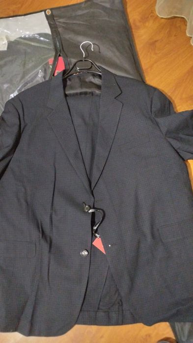 Кастюмы мужские черные в мелкую клетку