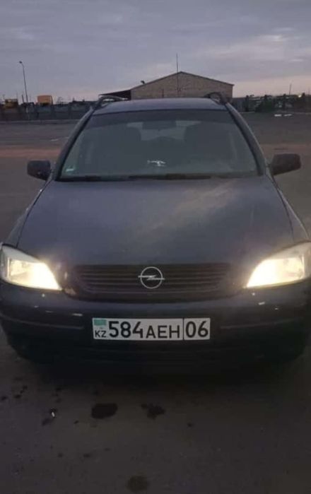Машина опель астра ж