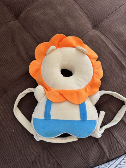 Предпазна възгланичка-раничка против падане