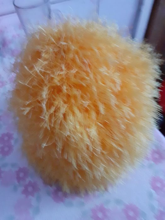 Caciula  din  material călduros  și pufos calduroasa