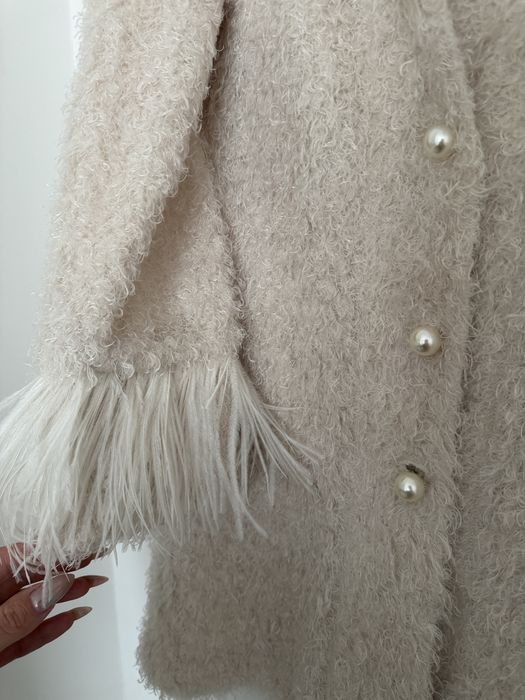 Ефектна жилетка с пера Illumminee