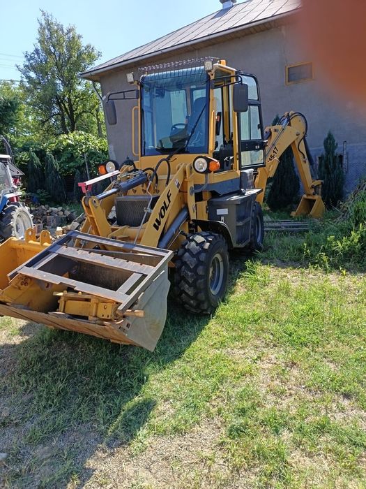 Buldoexcavator WOLF an 2020 cu doar 100 ore