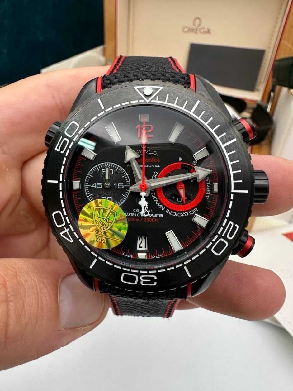 omega seamaster planetocean deep black / red