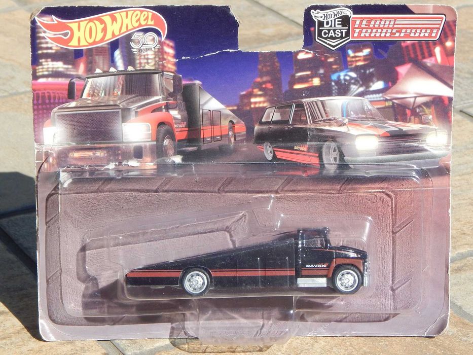 Macheta camion transport auto GMC Davan copie Hot Wheels cu ambalaj