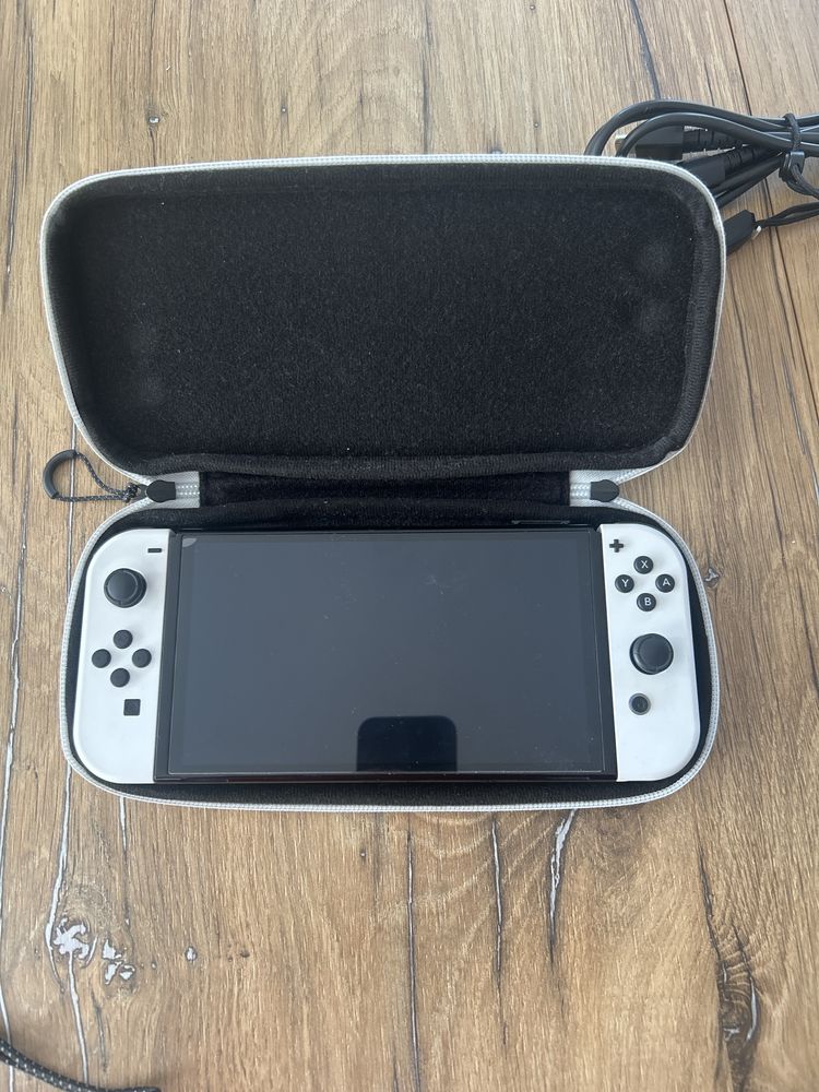Nintendo switch oled cu extra joycon si ringfit adventure