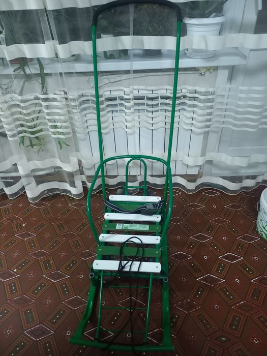 Продам санки с колесиками