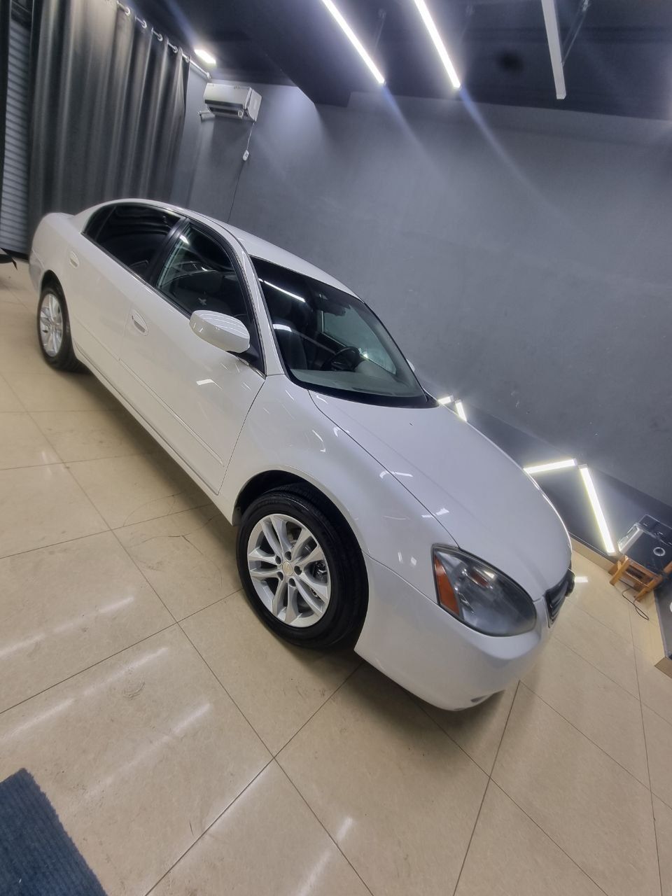 Nissan altima 2007 yil benzin gaz