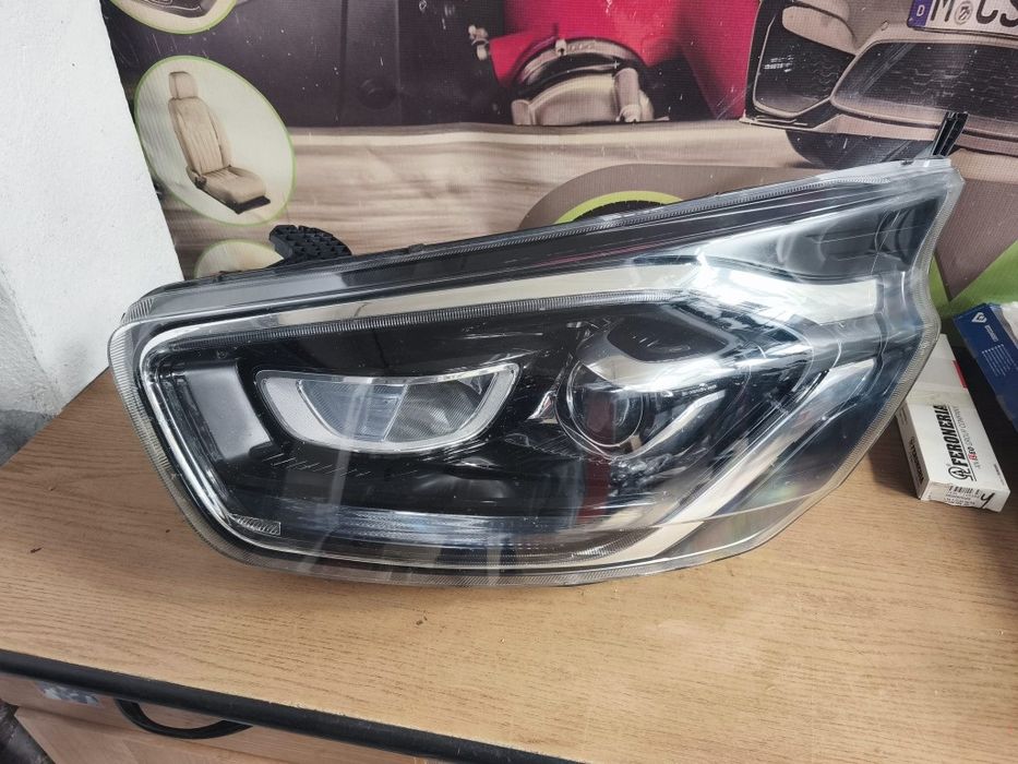 Far stânga Xenon Ford Transit Custom MK8. Cod: JK21-13D153-BG.