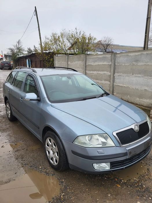 Usa fata stanga/ Usa fata dreapta/ Portiera Fata dreapta/Motor/Injectoare/ Portiera spate dreapta Skoda Octavia 2 break