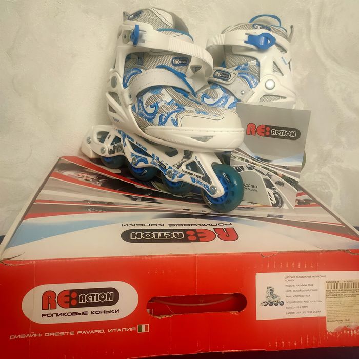 Роликовые коньки