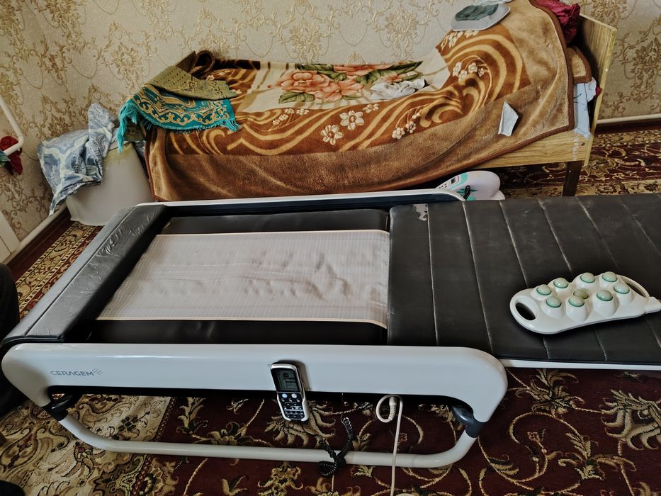 Csragem umurtqa bel massajori ham massaj qiladi ham qizdirad b/u