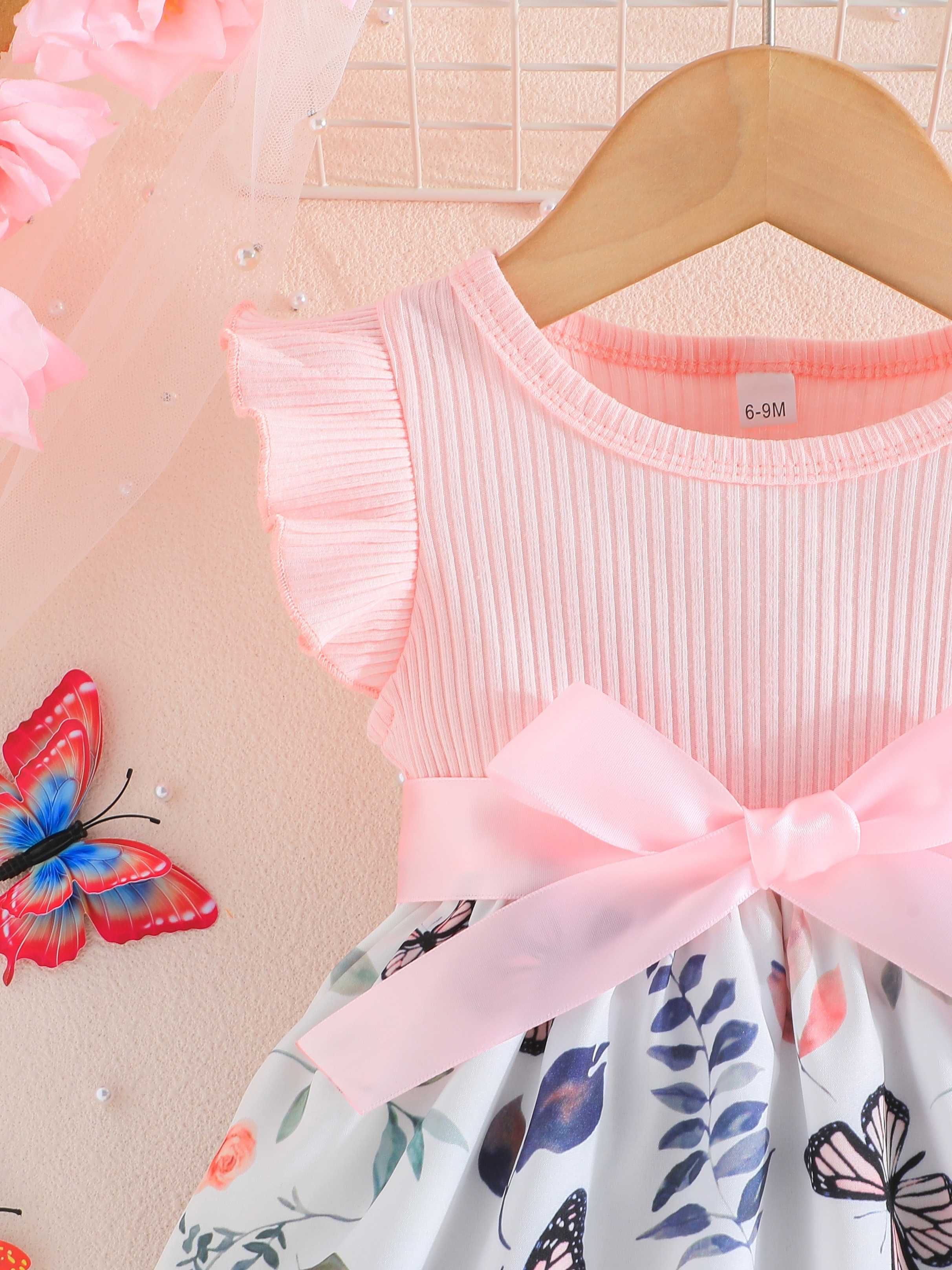 Елегантна рокля в розово с пеперуди за бебе момиче с колан панделка