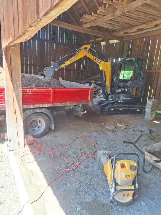 Execut excavații cu miniexcavatorul și transport basculabil