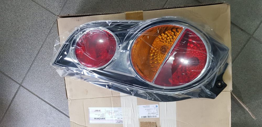 Far stop Chevrolet Aveo rama ochelar far