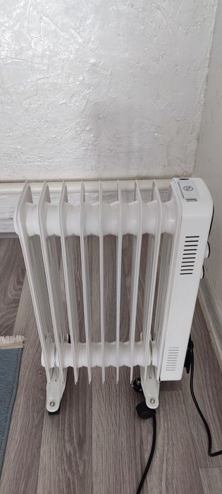 Продам обогреватель масляный радиатор