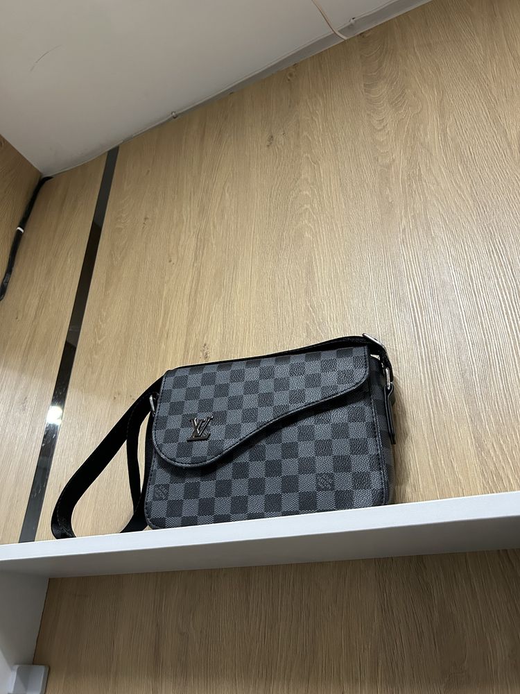 Барсетка от Louis Vuitton