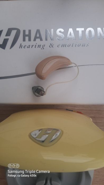 Aparat auditiv Hansaton 7HD cu reglaje.