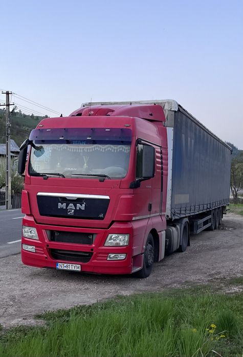 Man TGX+semiremorca Schmitz