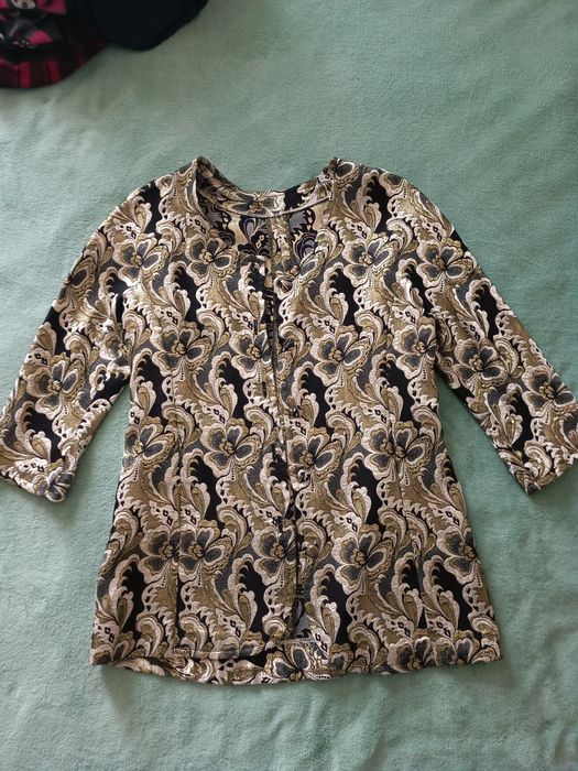 Taior elegant, facut la croitoreasa.