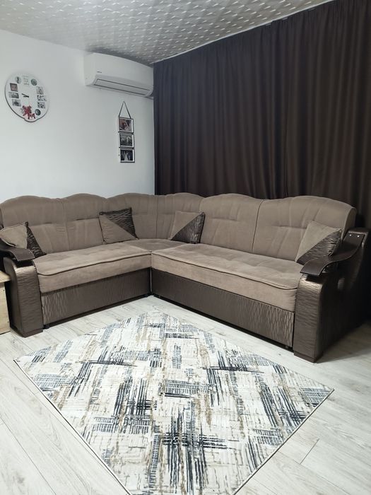 Colțar extensibil și reversibil