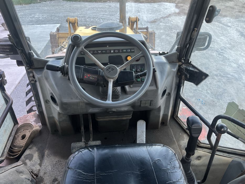 Buldoexcavator komatsu wb97R