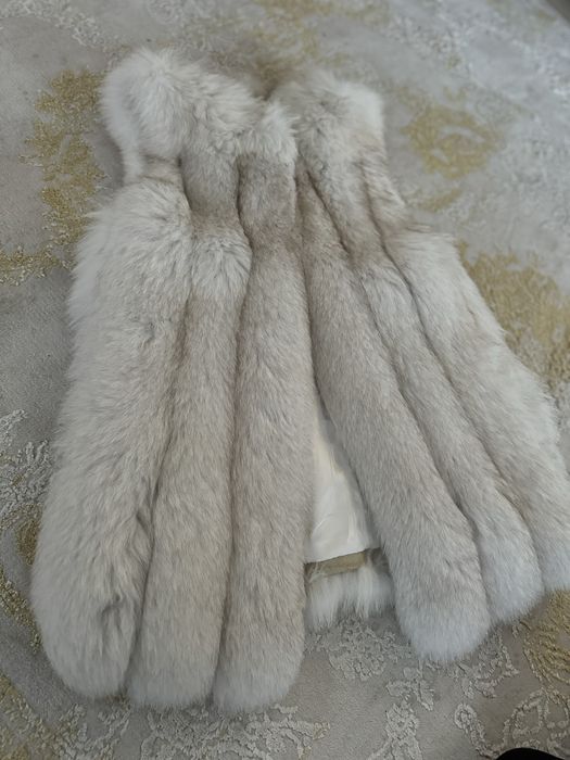 Vesta blana de vulpe