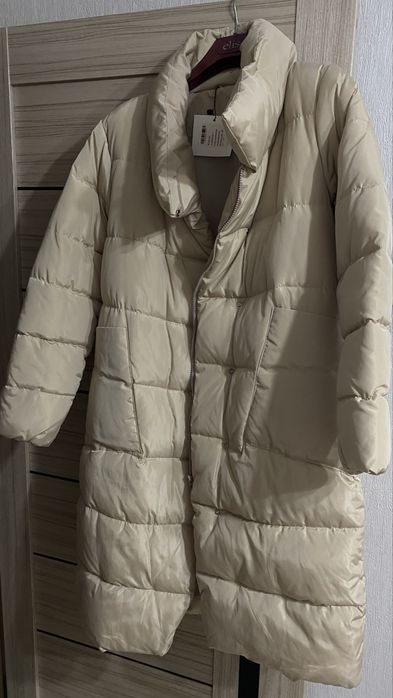 Продам пуховик 44-46 размер