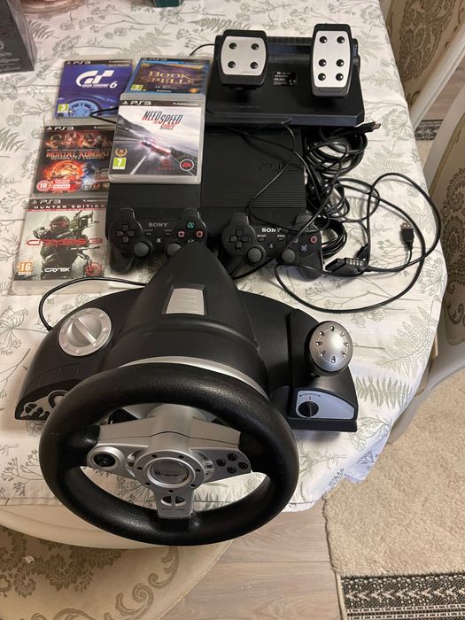PS3 5 jocuri + volan și pedale + 2 console + toate cablurile