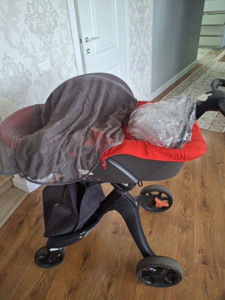Stokke V6 коляска и люлька