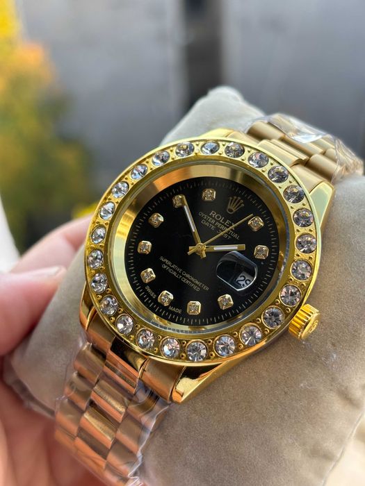 Ceas dama/barbatesc Auriu cu interior Negru 18K