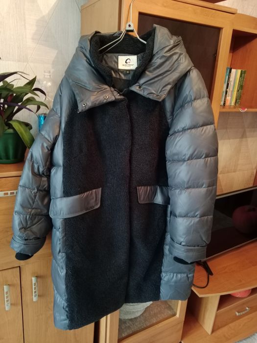 Продам женский пуховик.