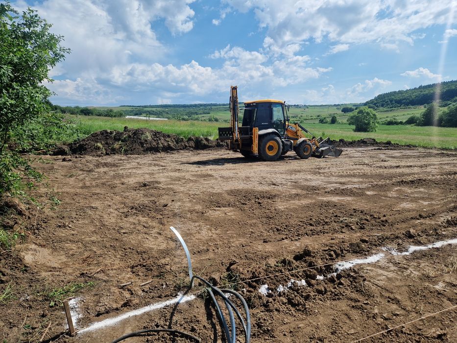 Închiriez Buldoexcavator și Camioane 8x4