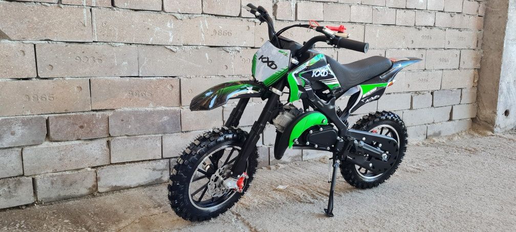 Cross 49cc adus din Germania pentru copii cu motor pe benzina in 2 t