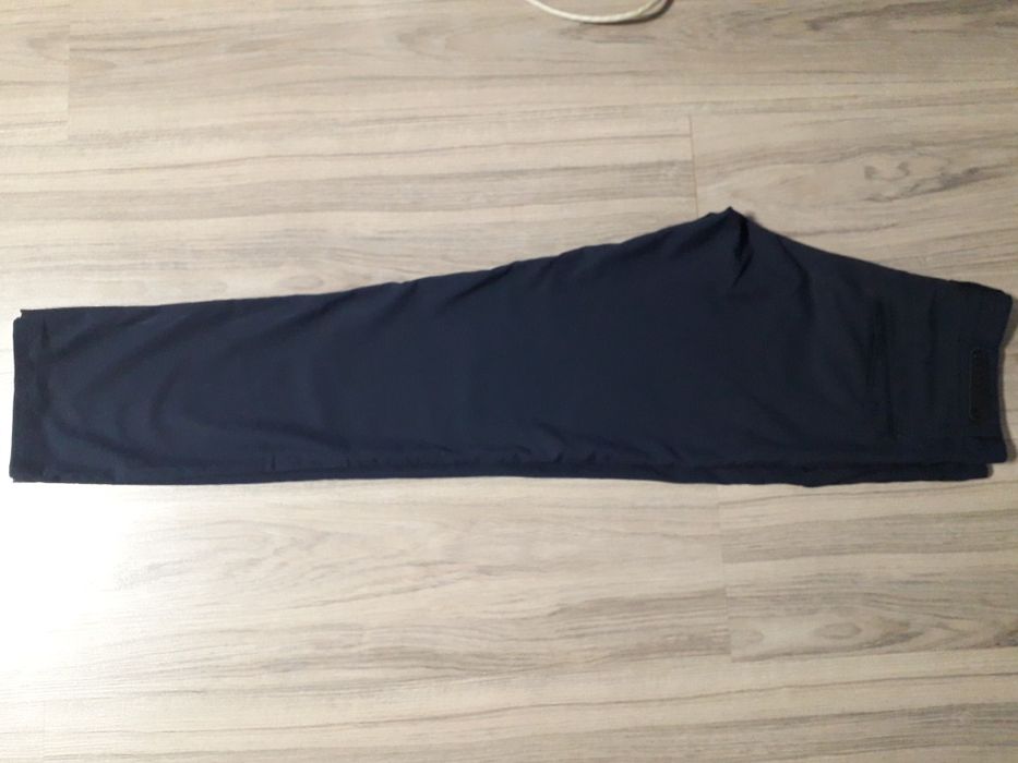 Продам фирменные брюки  р 48