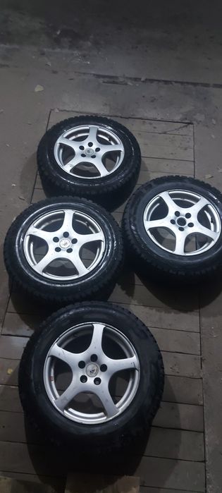 Продам титановые диски с резиной