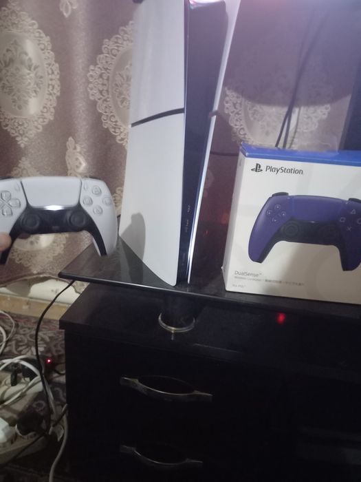 PS5 slimi ideal 1TB hotirasi o'yinlari yozilgan 2 ta original djoystik