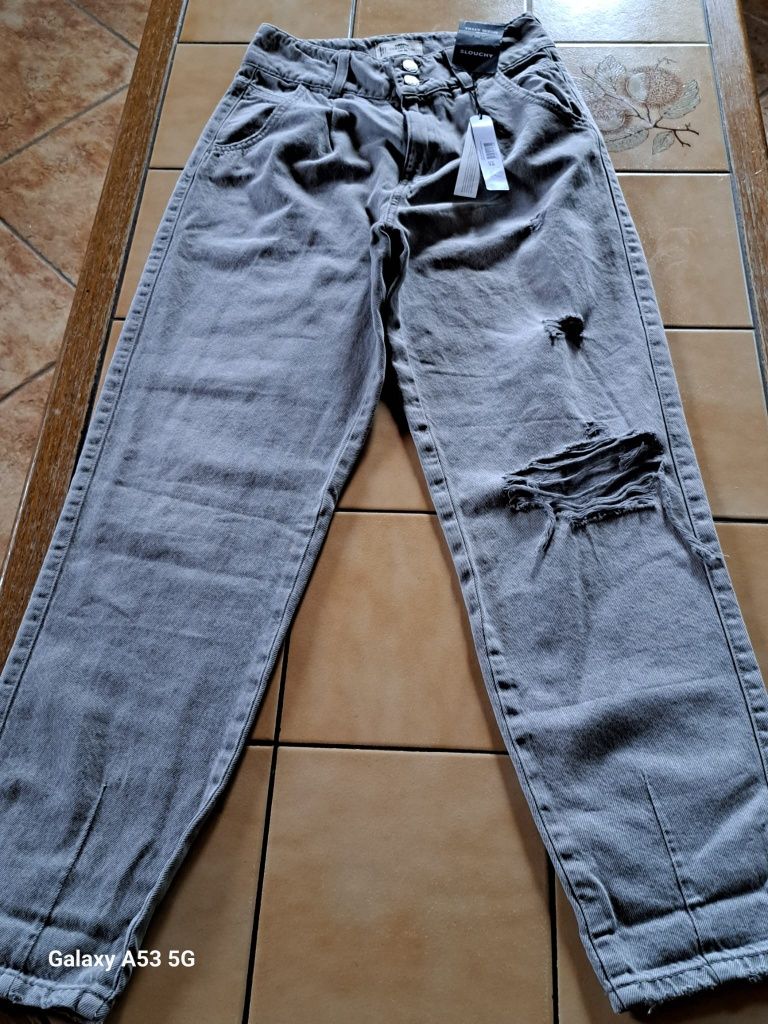 Blugi de denim noi