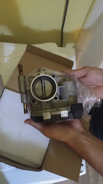 Дроселова клапа.