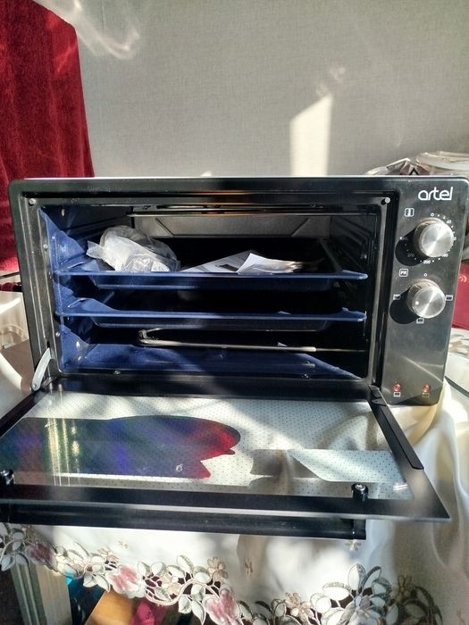 Продаётся мини печь Artel новая